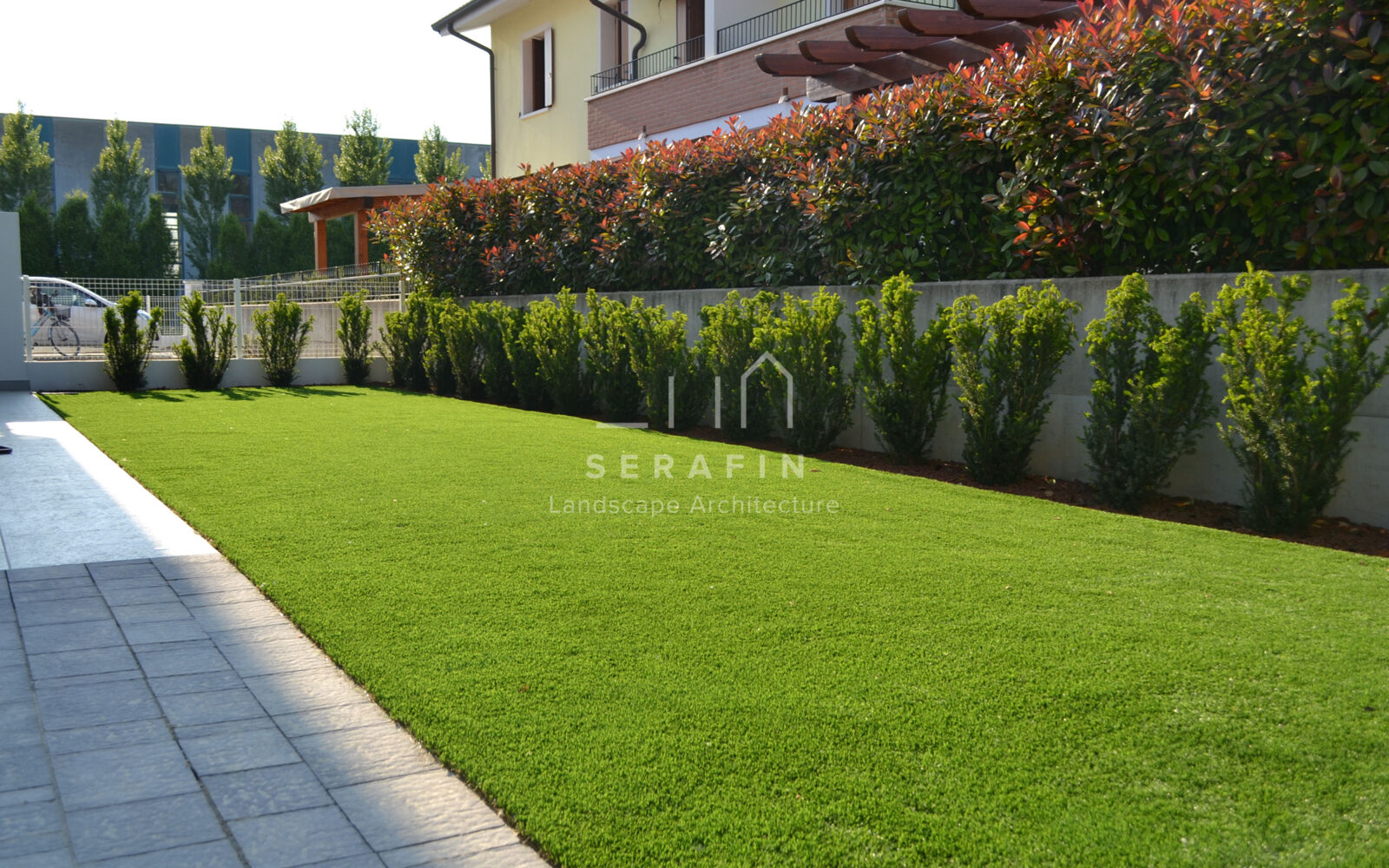 private garden with synthetic grass carpet - 1